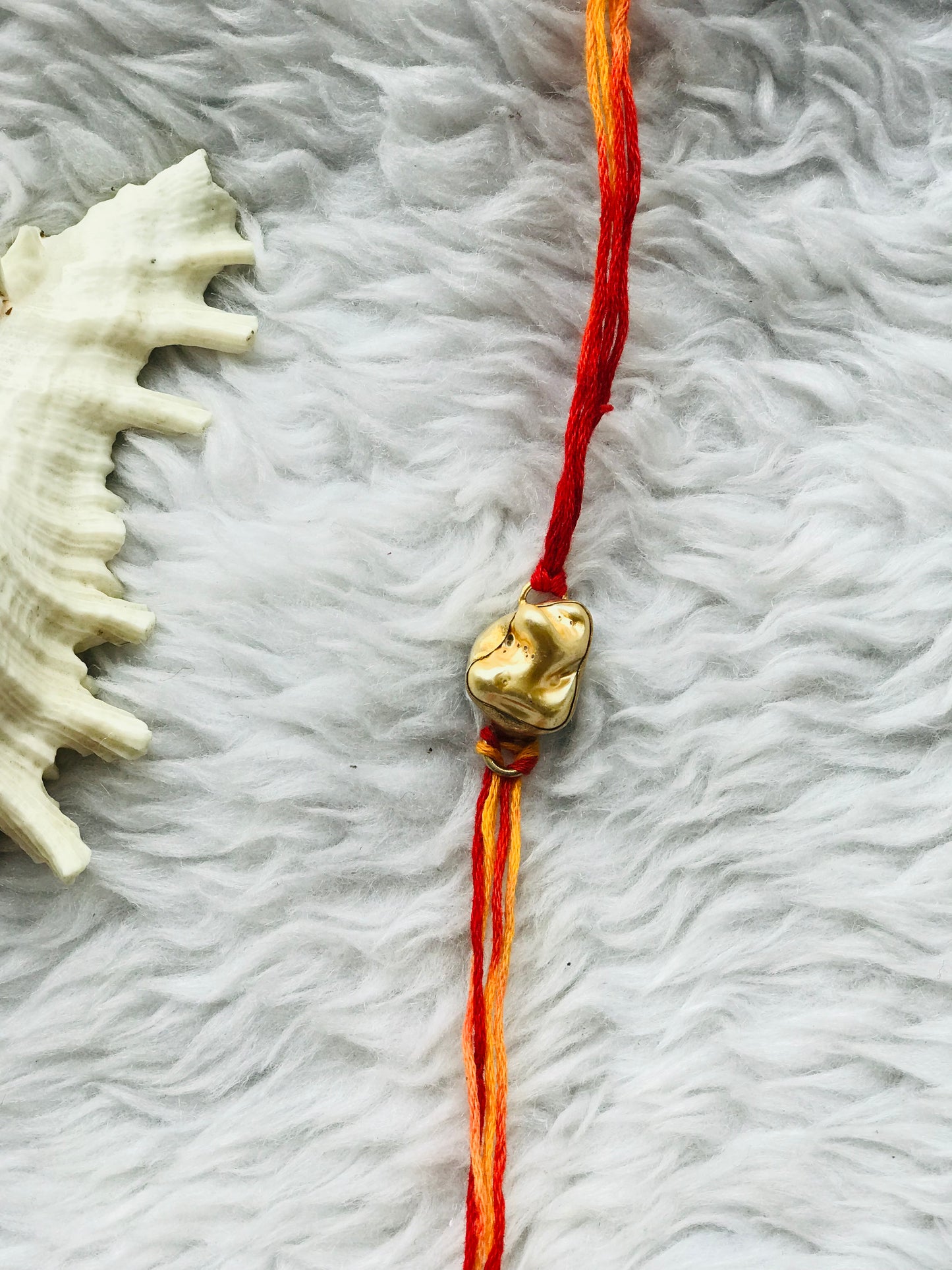 Yellow pearl in brass metal 18k gold plated