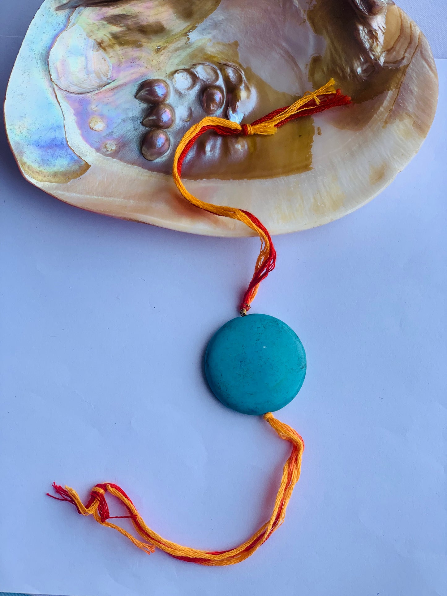 Tourquise stone in mauli thread