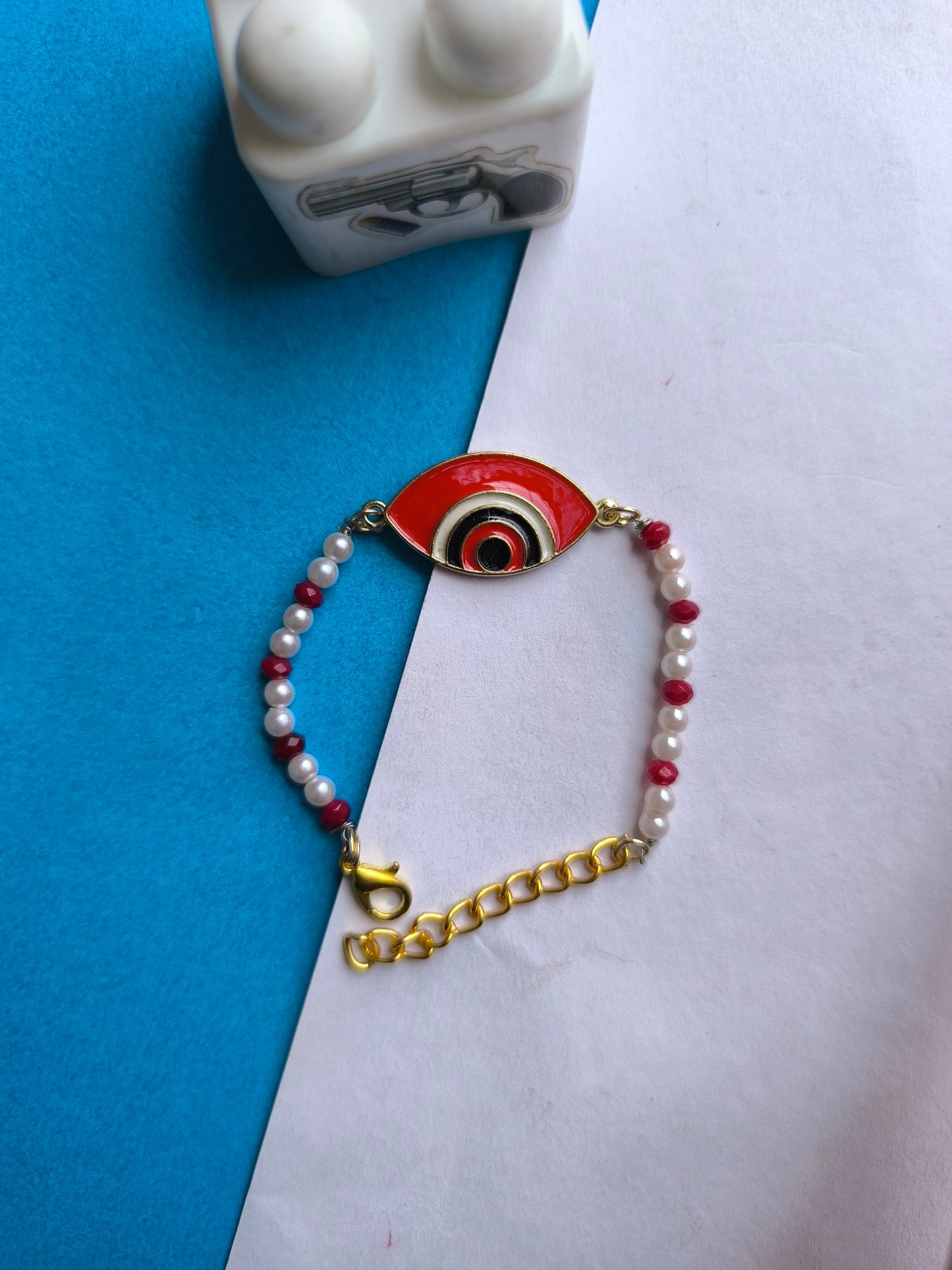 RED EVIL EYE CHARM WITH BEADS