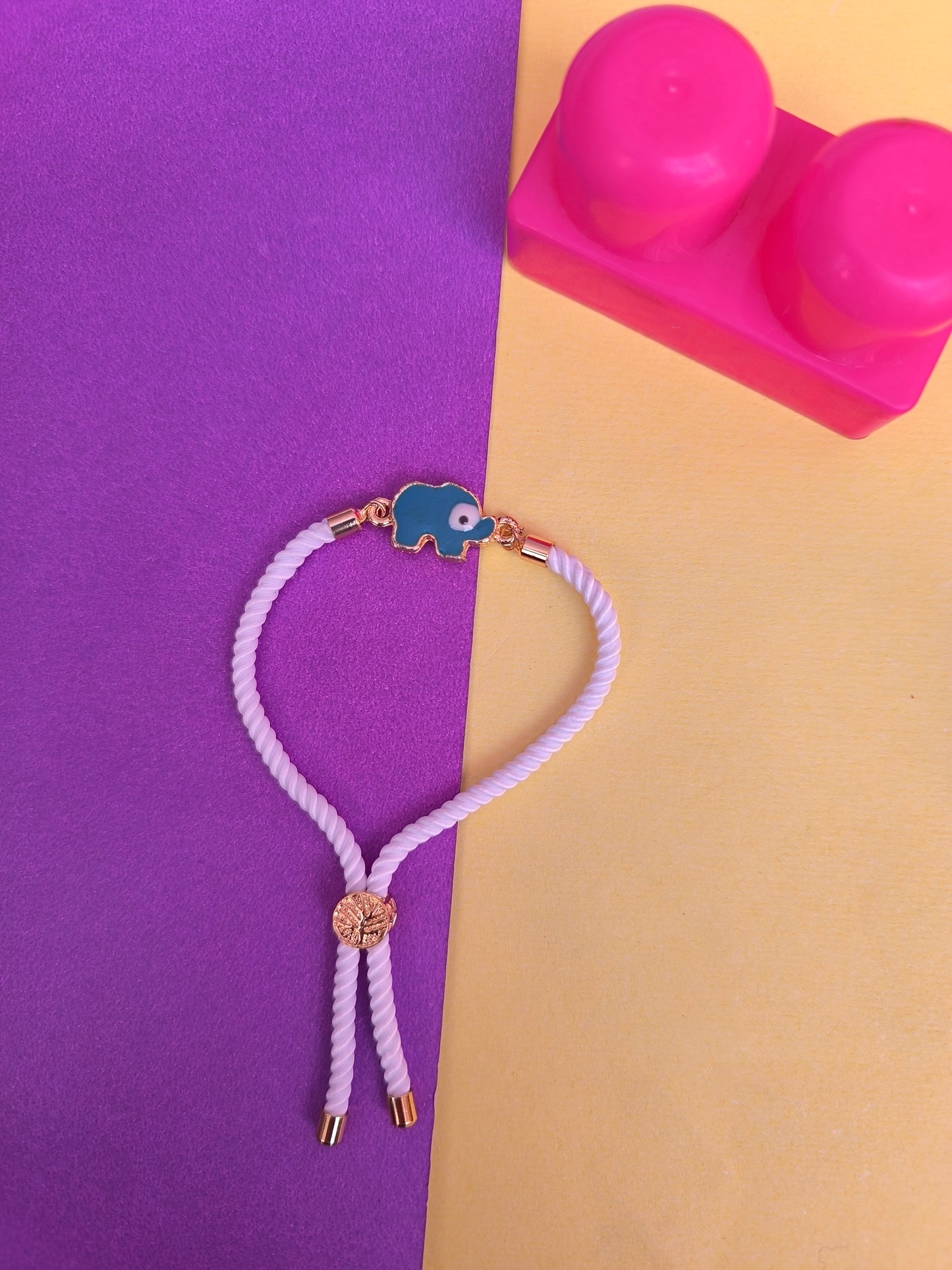 Elephant charm with white thread