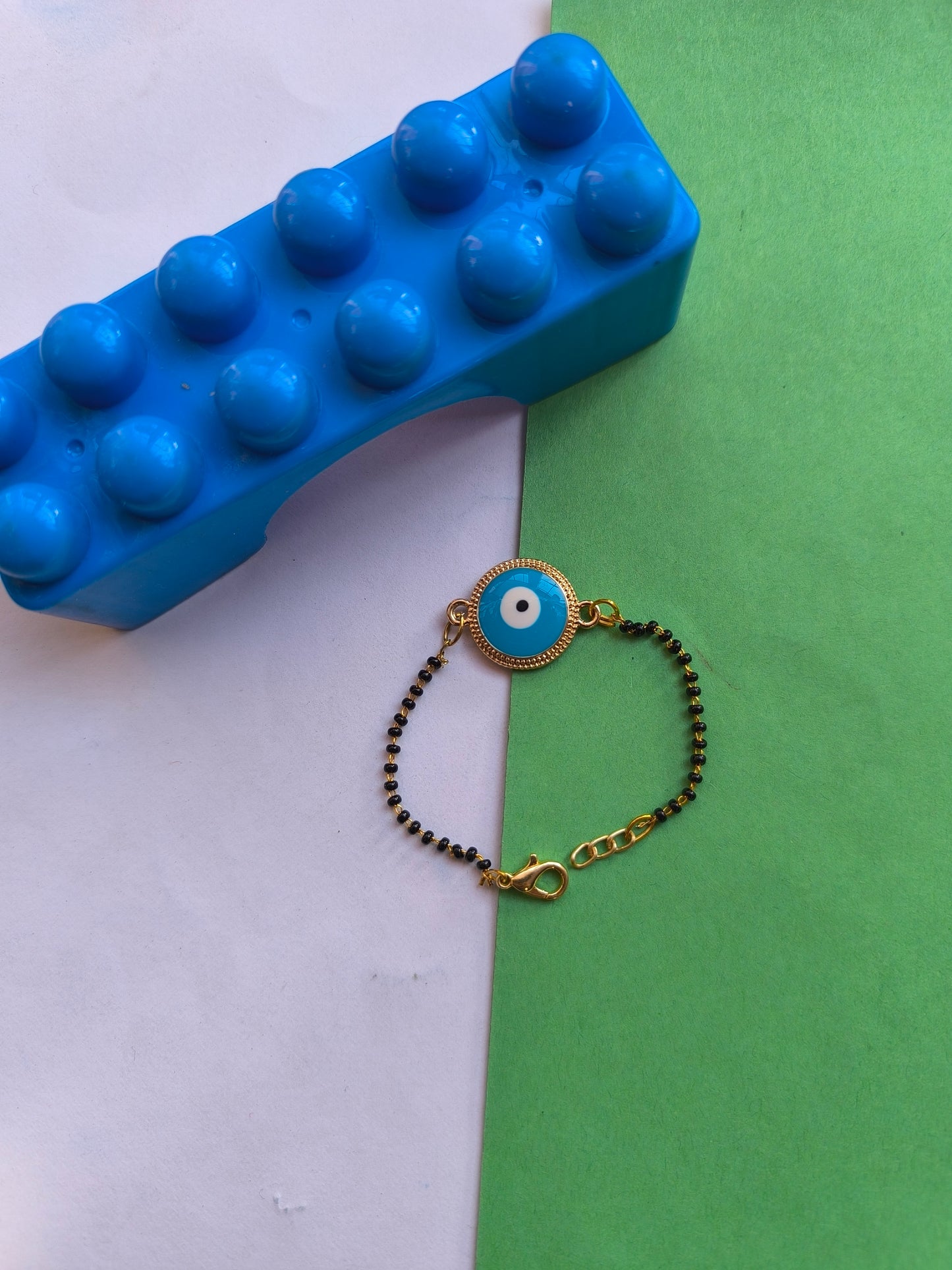 Blue evil eye charm in nazar chain