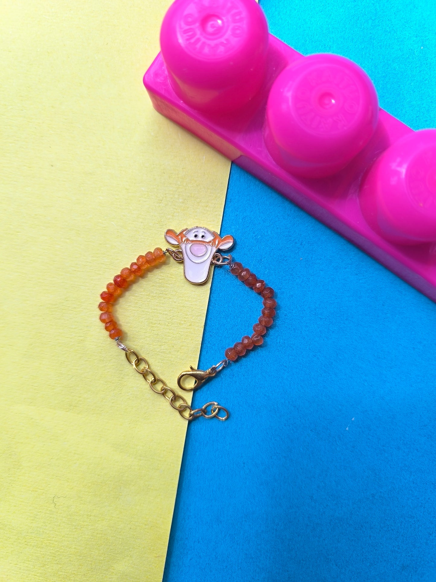 Lion charm with beads