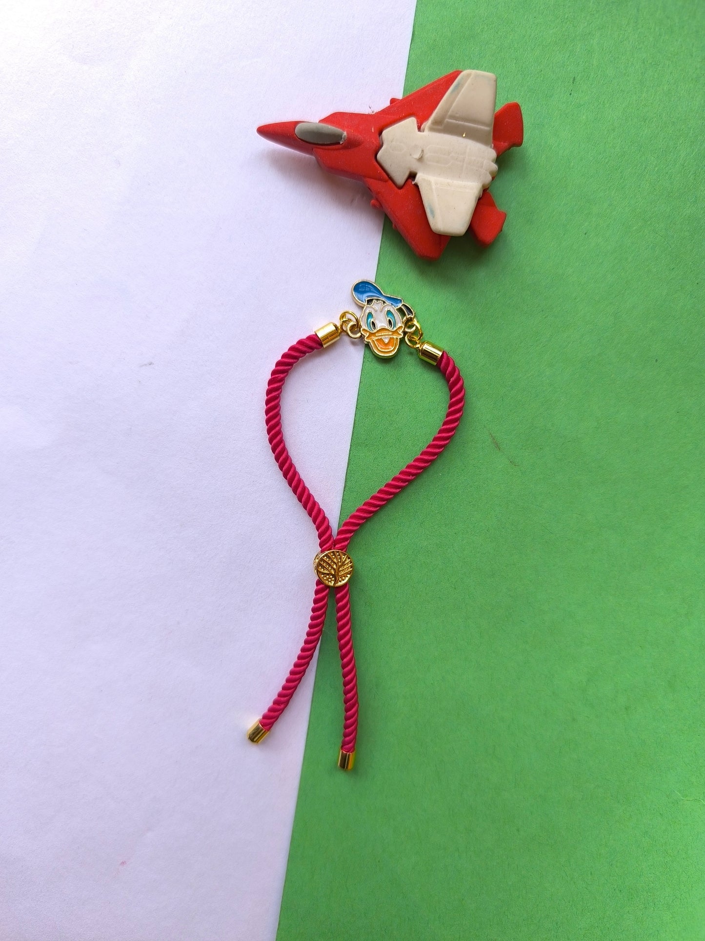 DONALD DUCK CHARM WITH PINK THREAD ADJUSTABLE