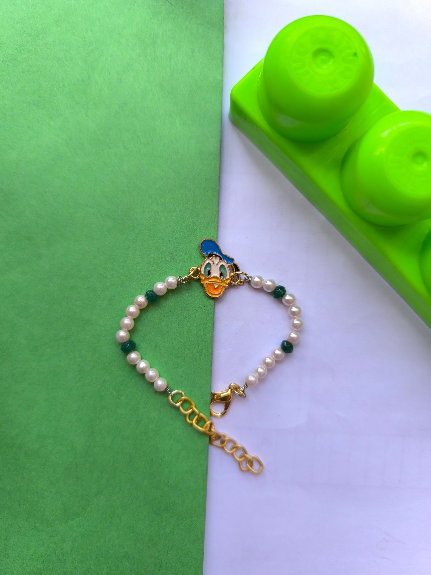 Donald charm with beads