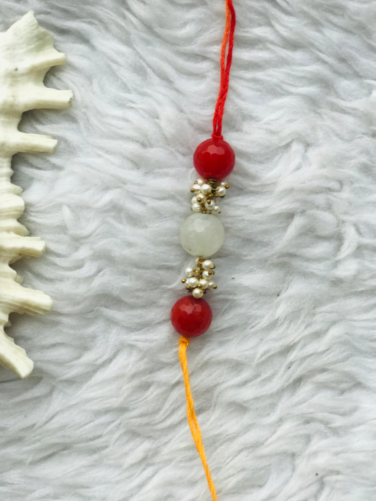 Onyx stone with pearl mauli rakhi