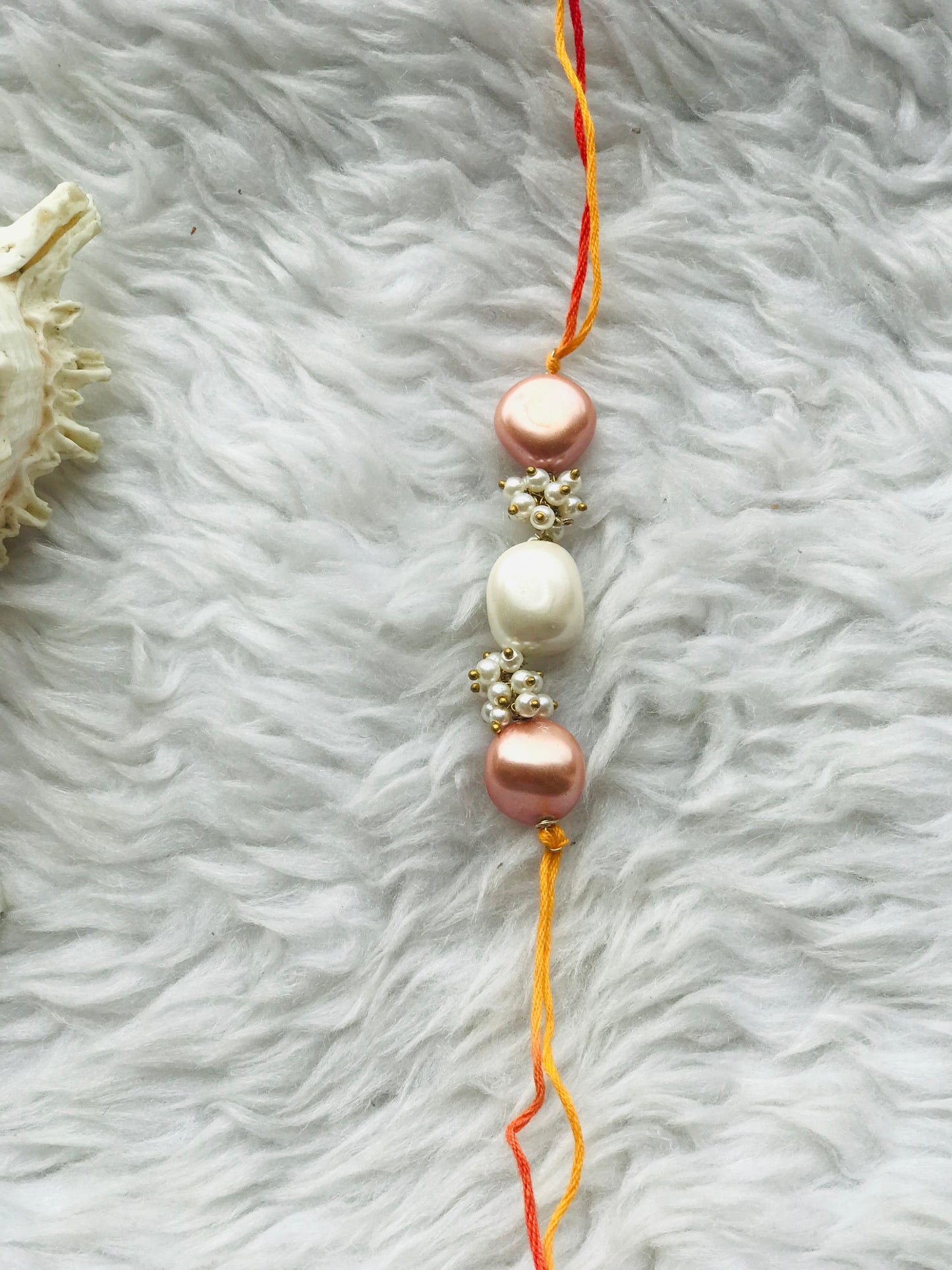 Pink pearl with beads in mauli