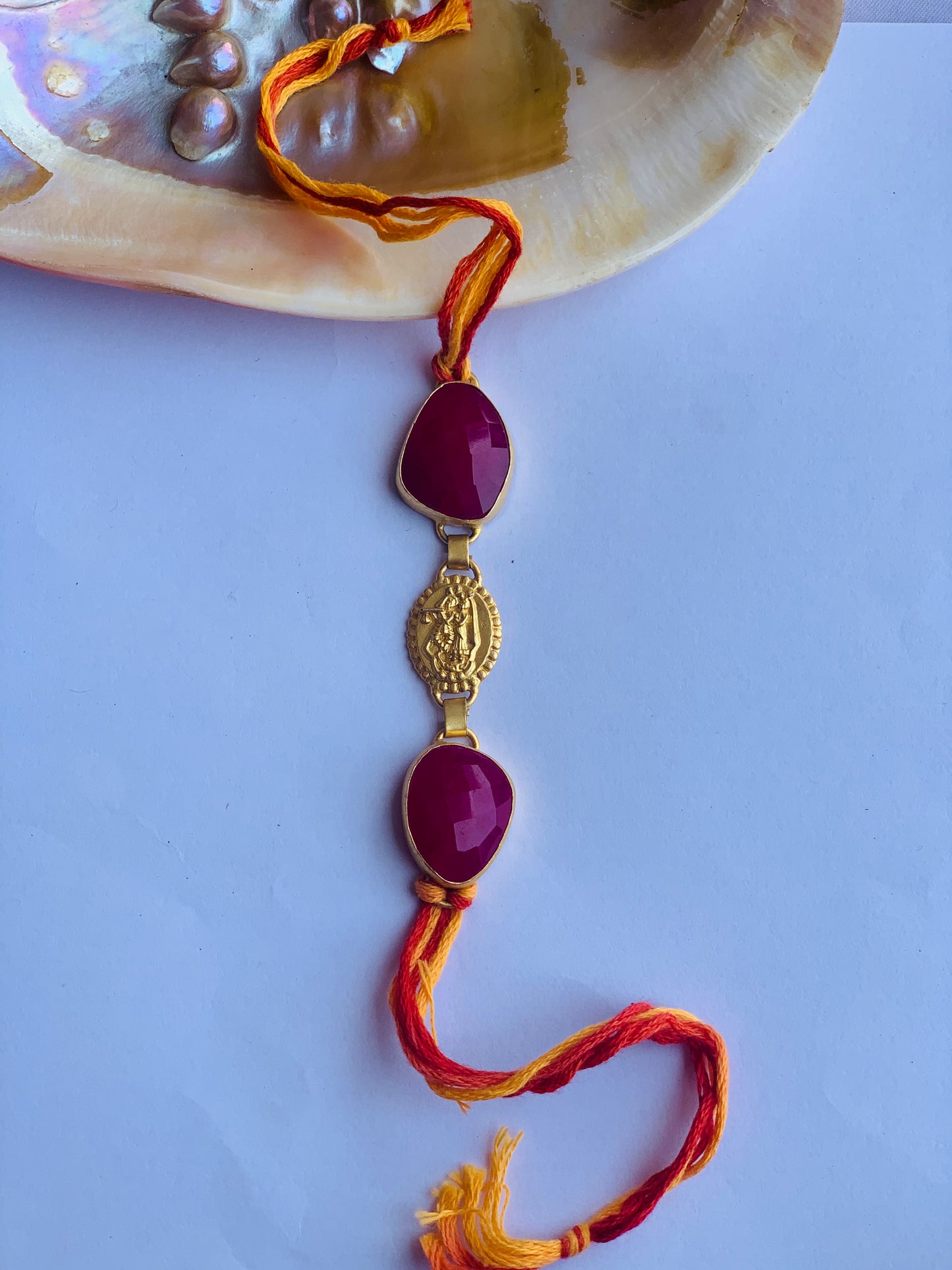 Pink ropada stone rakhi