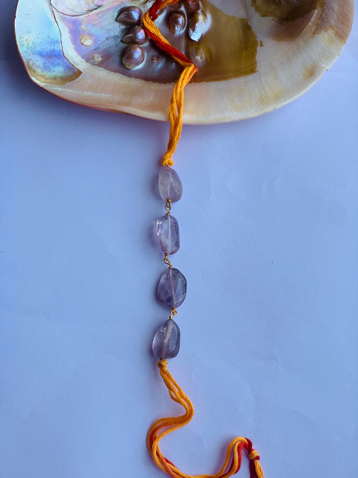Amethyst stone rakhi in mauli