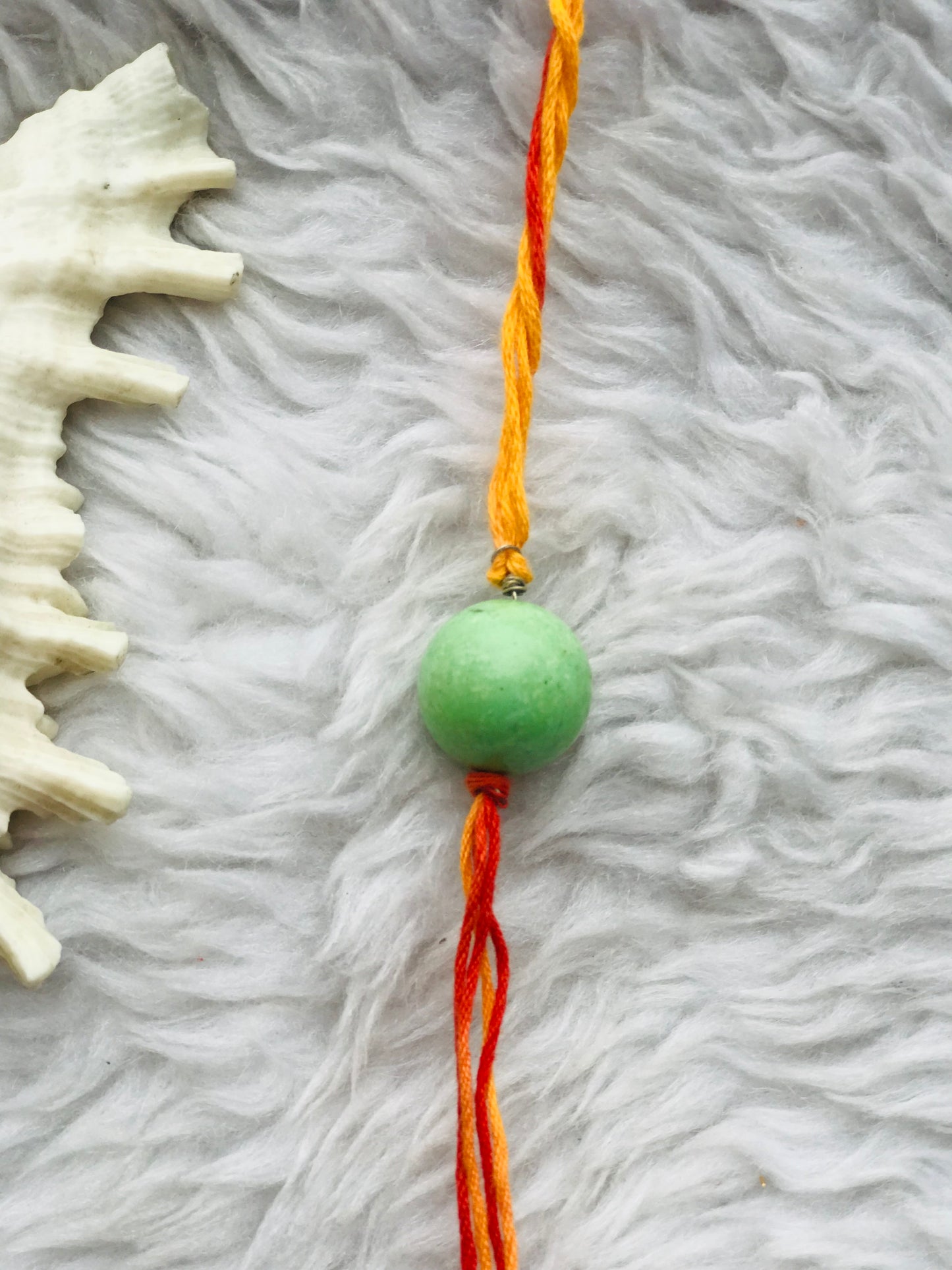 Tourquise green colour stone in mauli thread