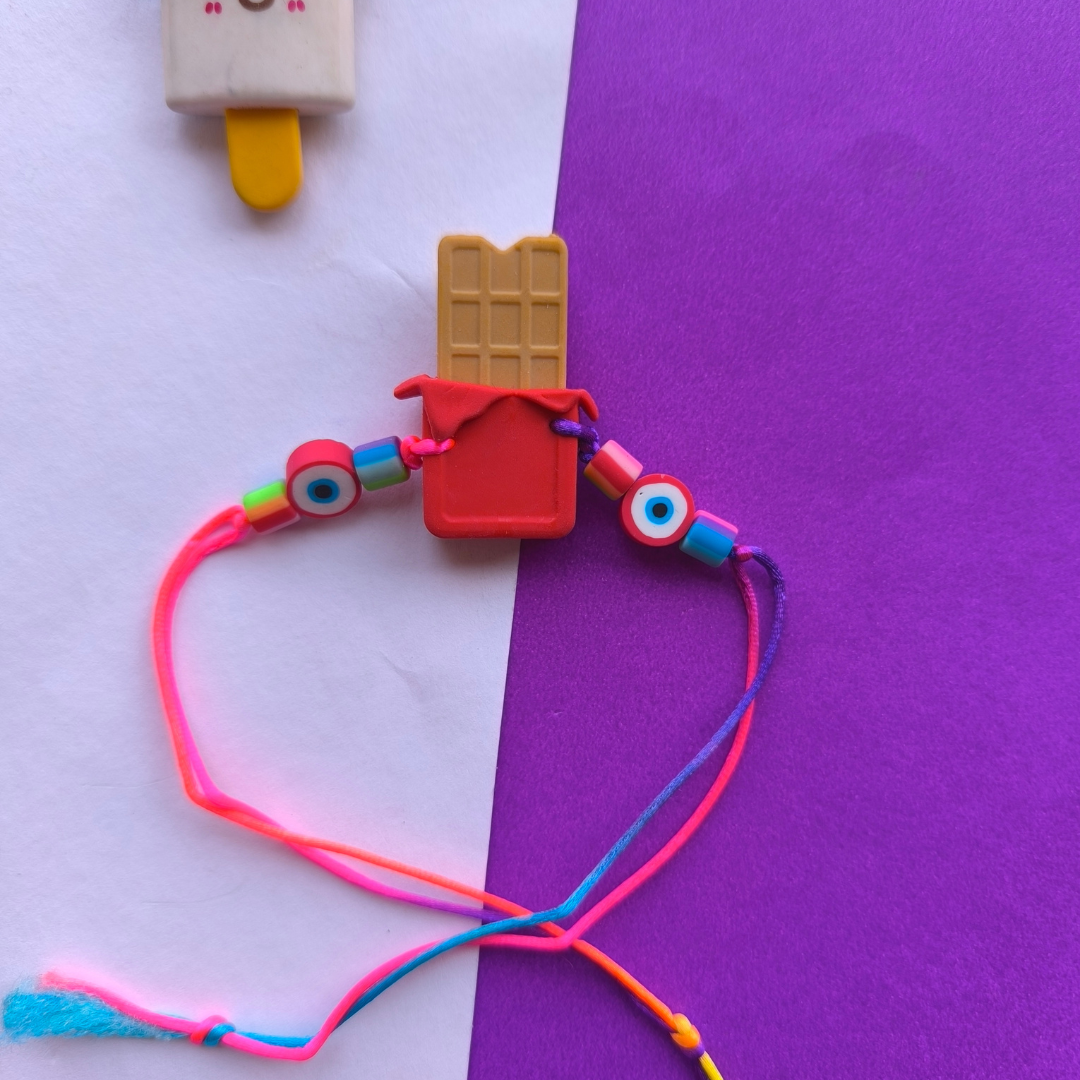 CHOCOLATE ERASER WITH COLOUR BEADS & THREAD