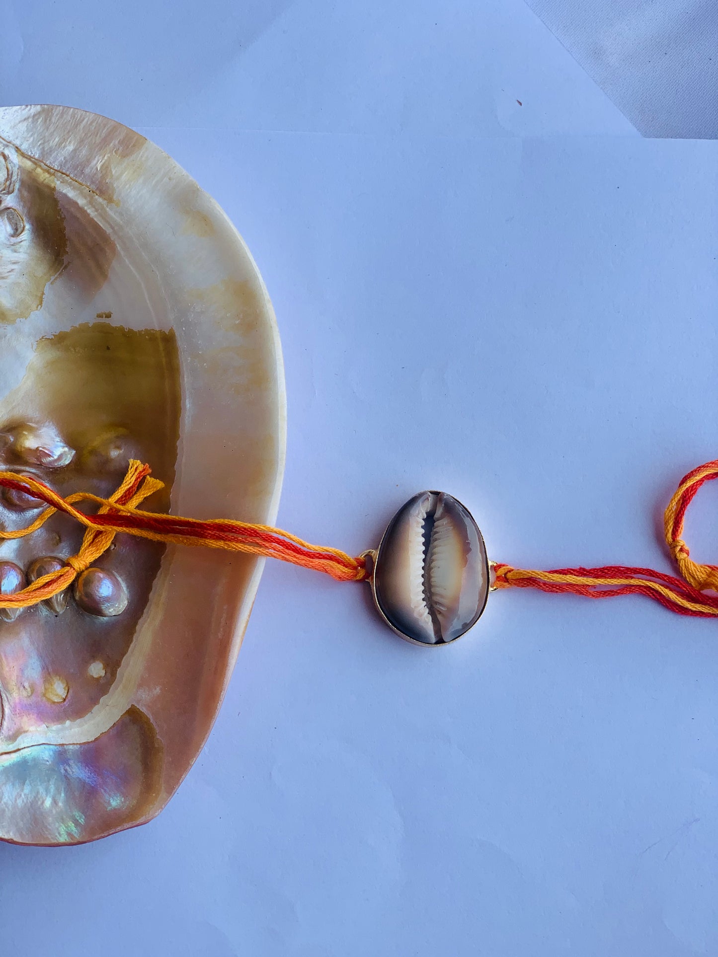 khodi in brass metal 18k gold plated in mauli thread