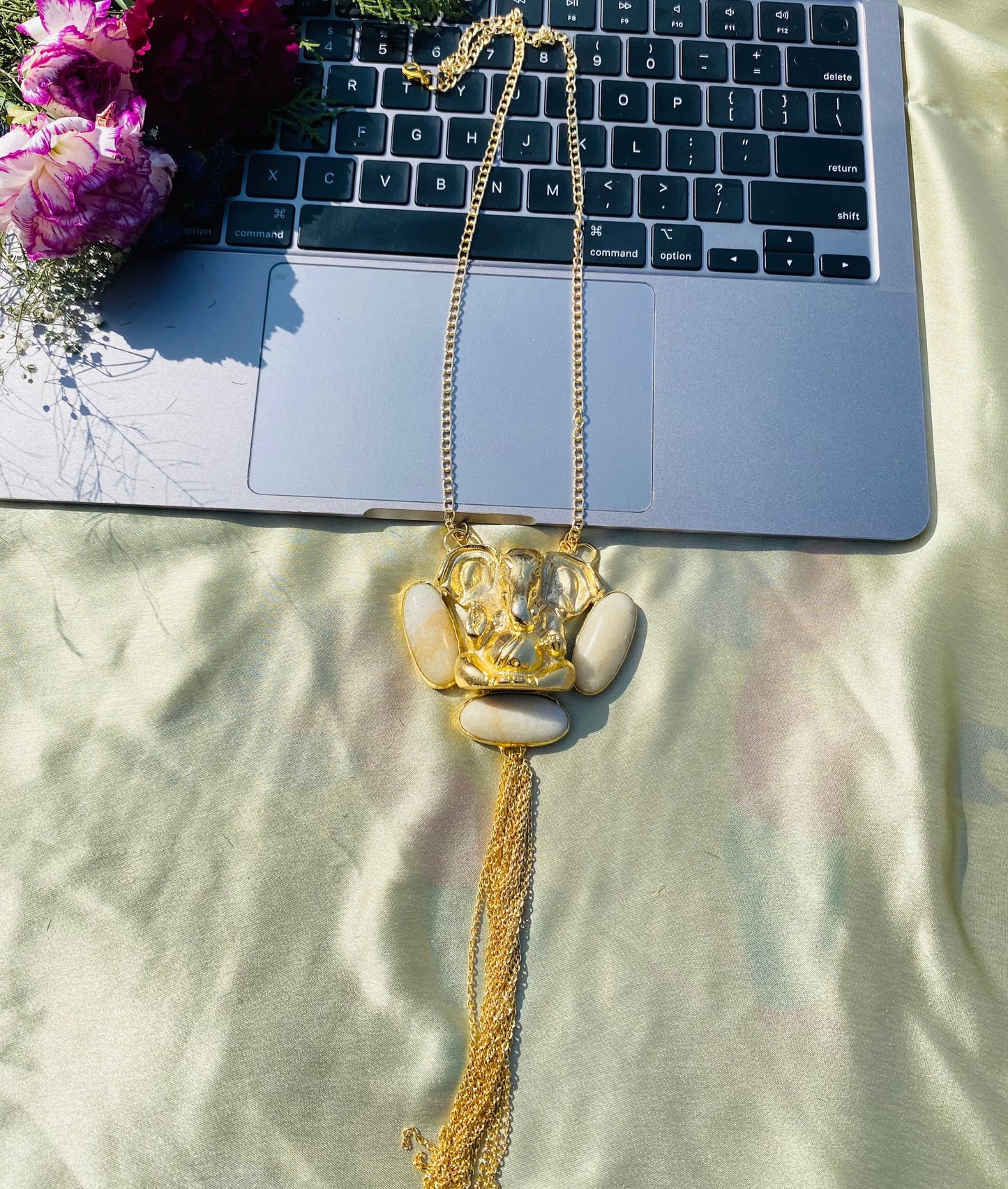 Ganesha Wrapped In Opal Pendant