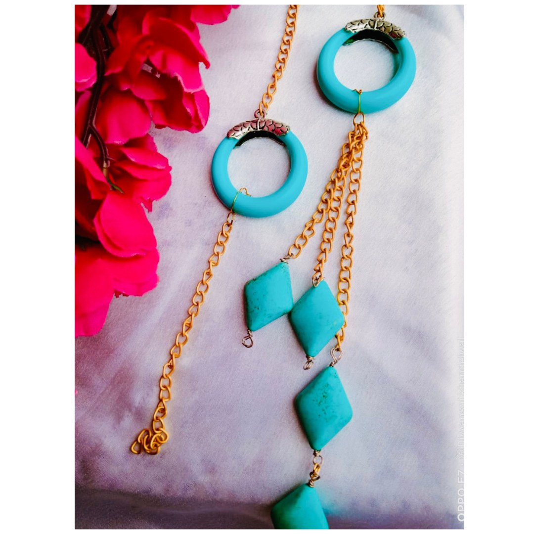 Turquoise Tube with Diamond Couple Rakhi