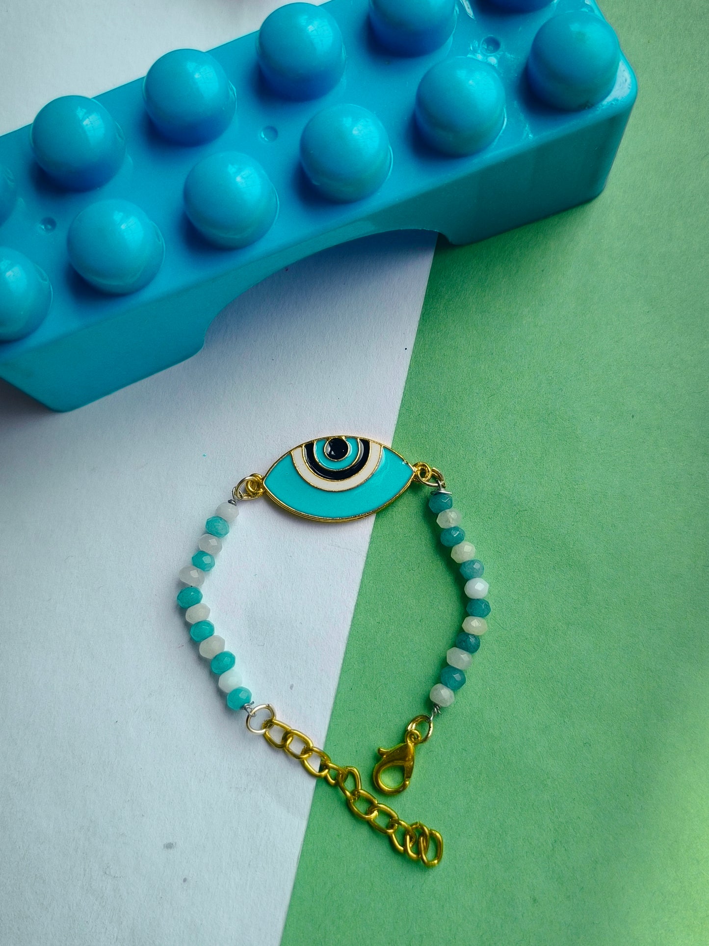 BLUE EVIL EYE CHARM WITH BEADS