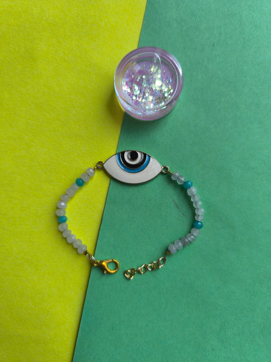 WHITE EVIL EYE CHARM WITH BEADS