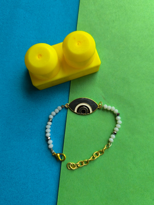 BLACK EVIL EYE CHARM WITH BEADS