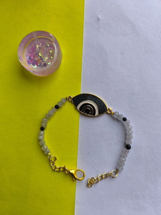 BLACK EVIL EYE CHARM WITH BEADS