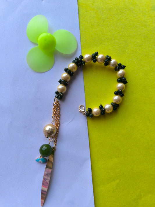 Yellow pearl with green beads bracelet