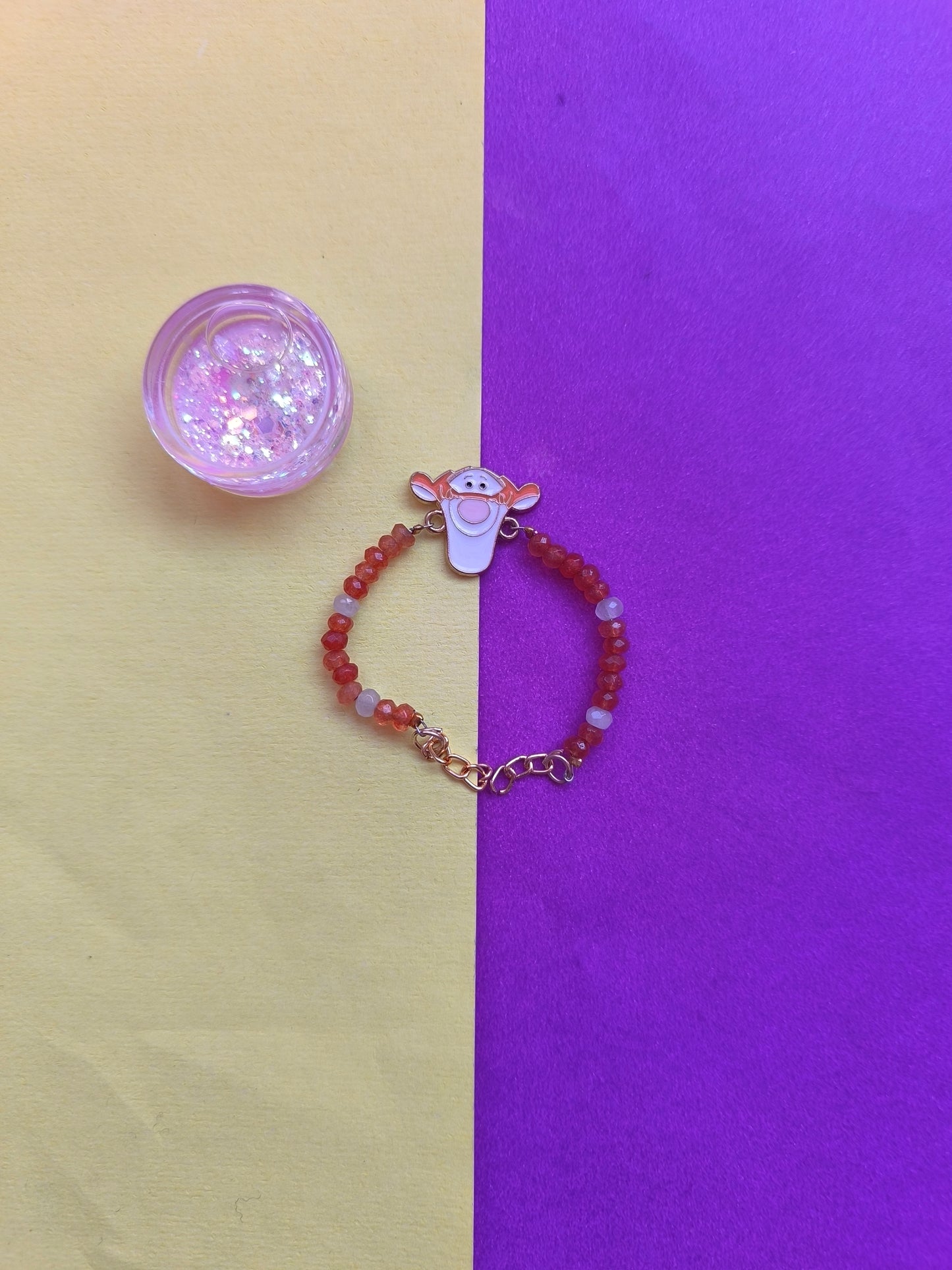 Lion charm with beads