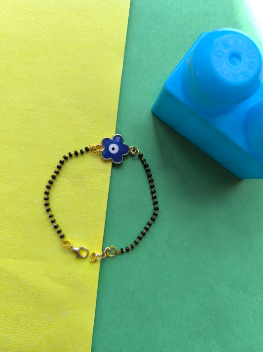 Blue evil eye charm in nazar chain