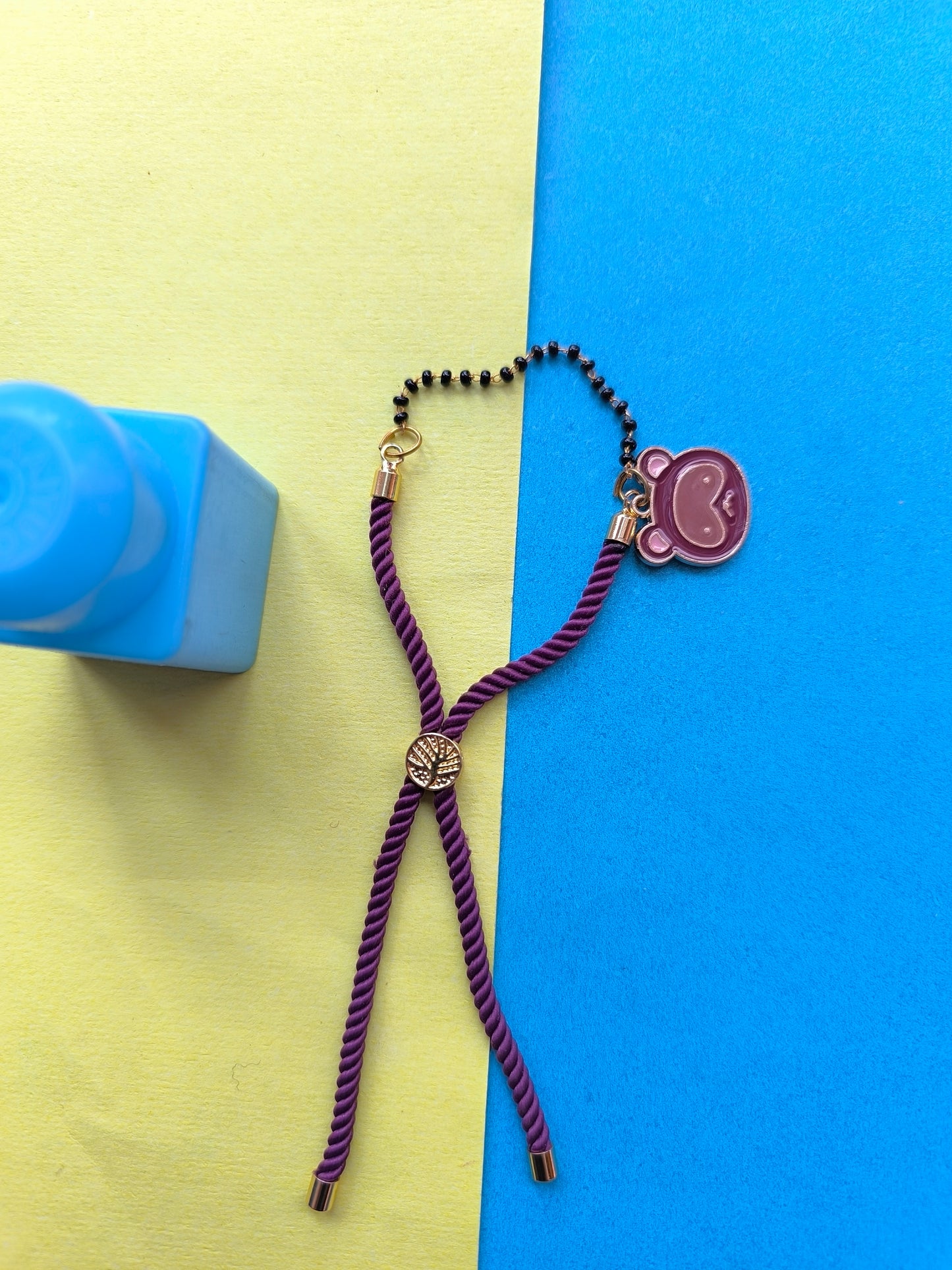 Cartoon charm with thread