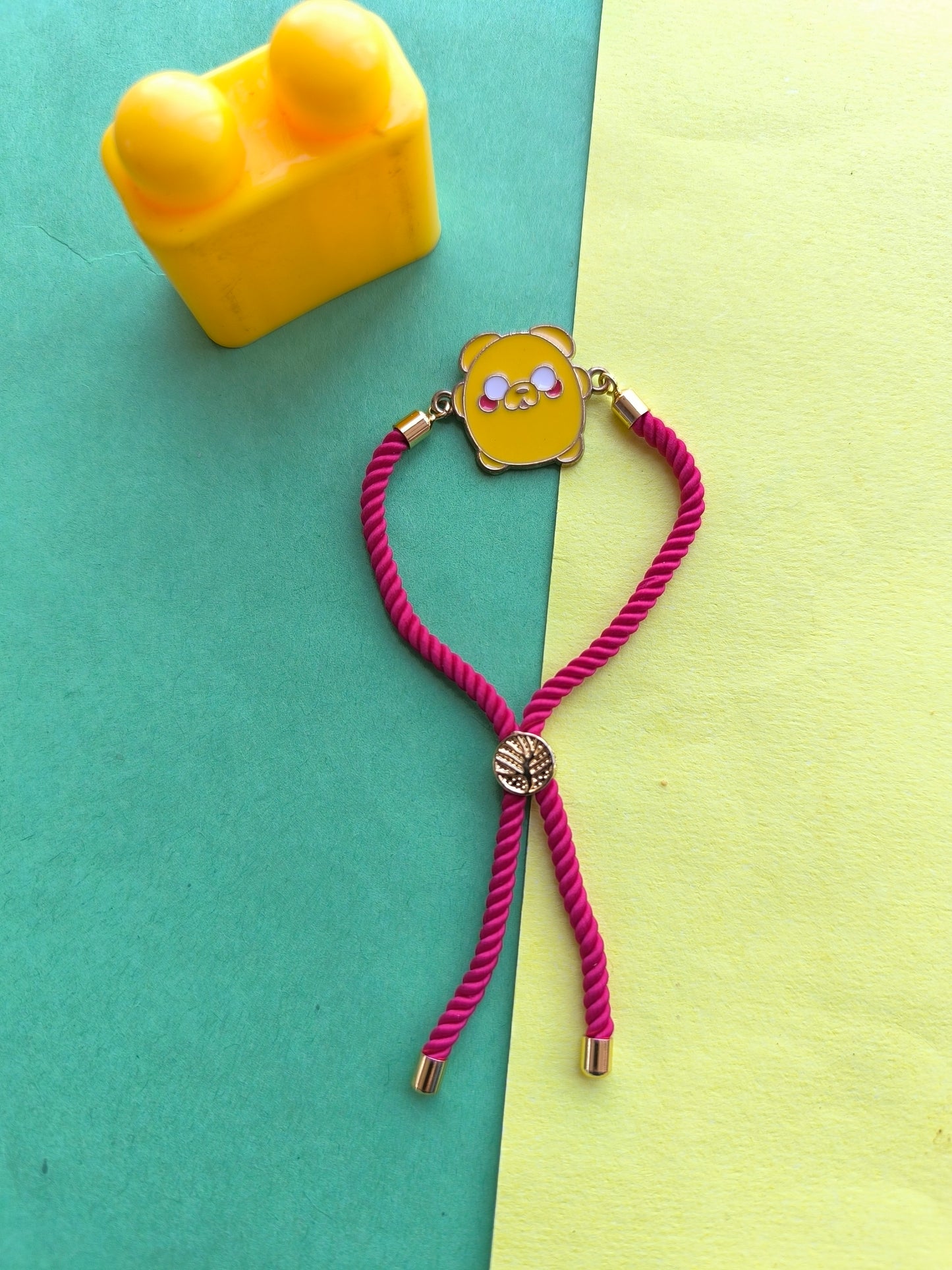 Cartoon charm with pink thread adjustable