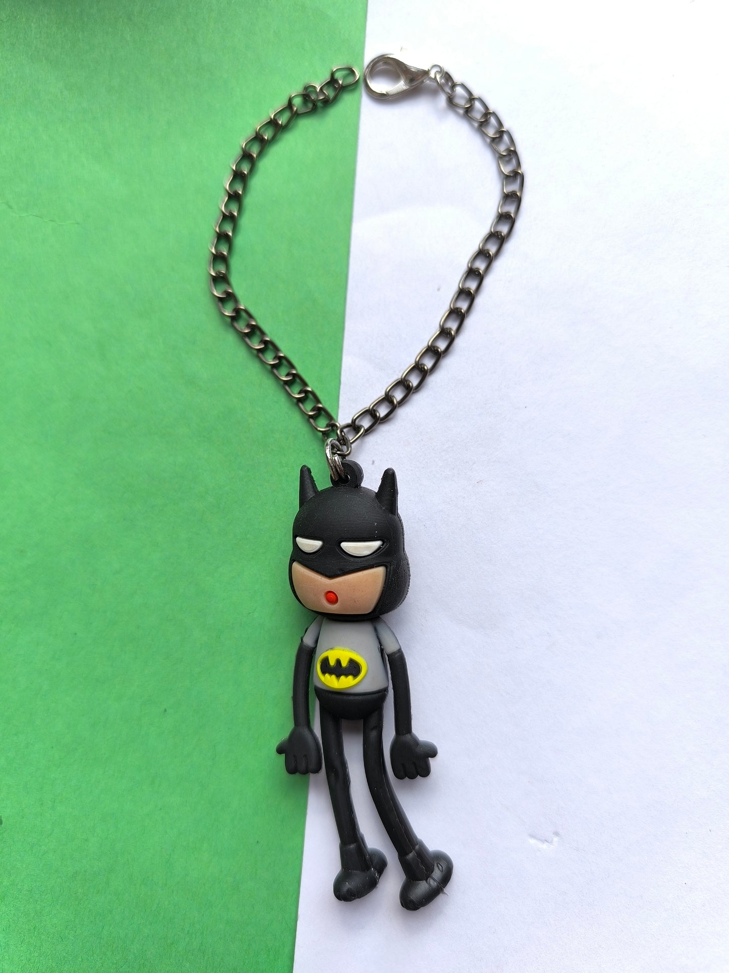 Batman article with charm