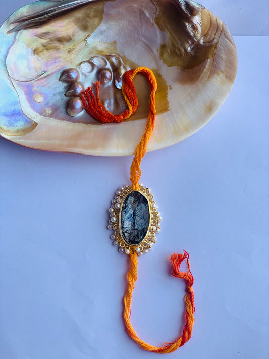 Rutile stone with pearl beaded mauli rakhi
