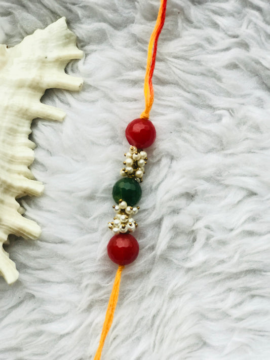 Onyx stone with pearl mauli rakhi