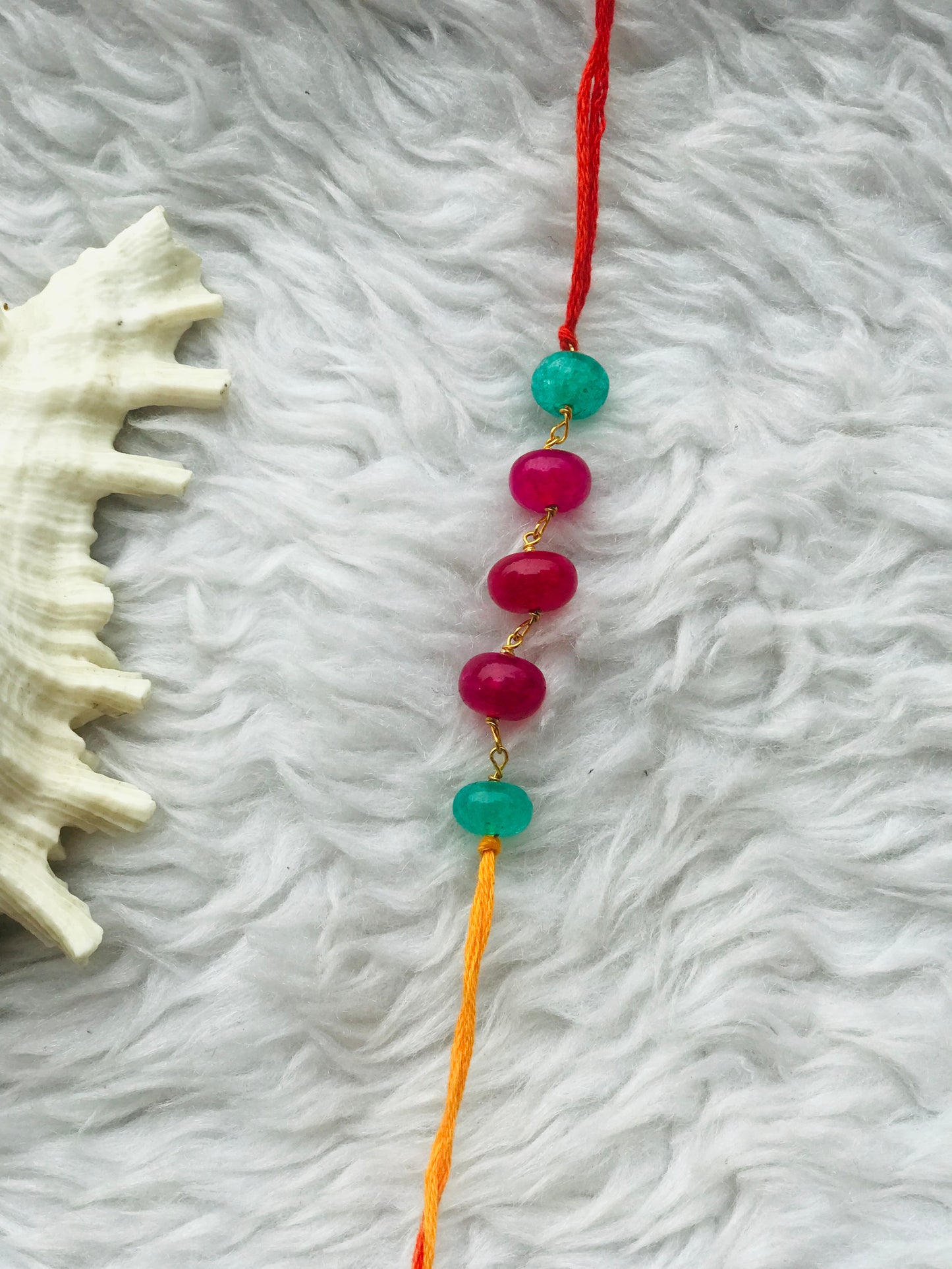 Pink & Green ropada stone with mauli