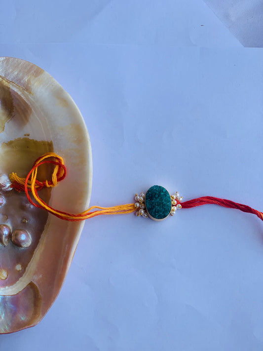 green sugar drossy with pearl rakhi