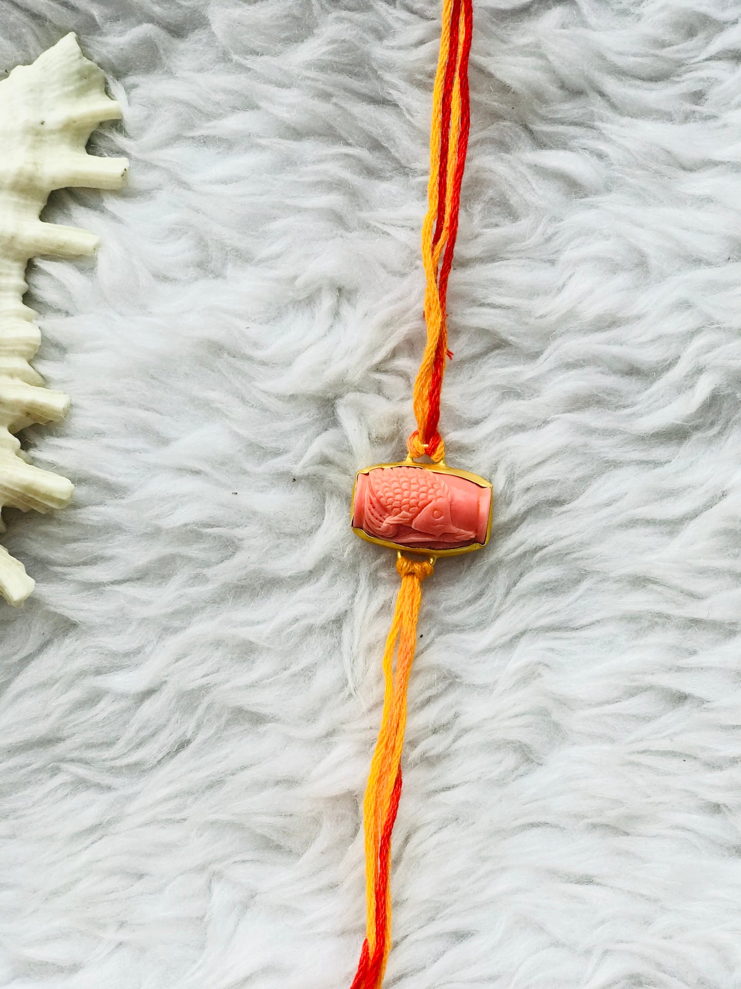 Carving coral stone in brass metal 18k gold plated