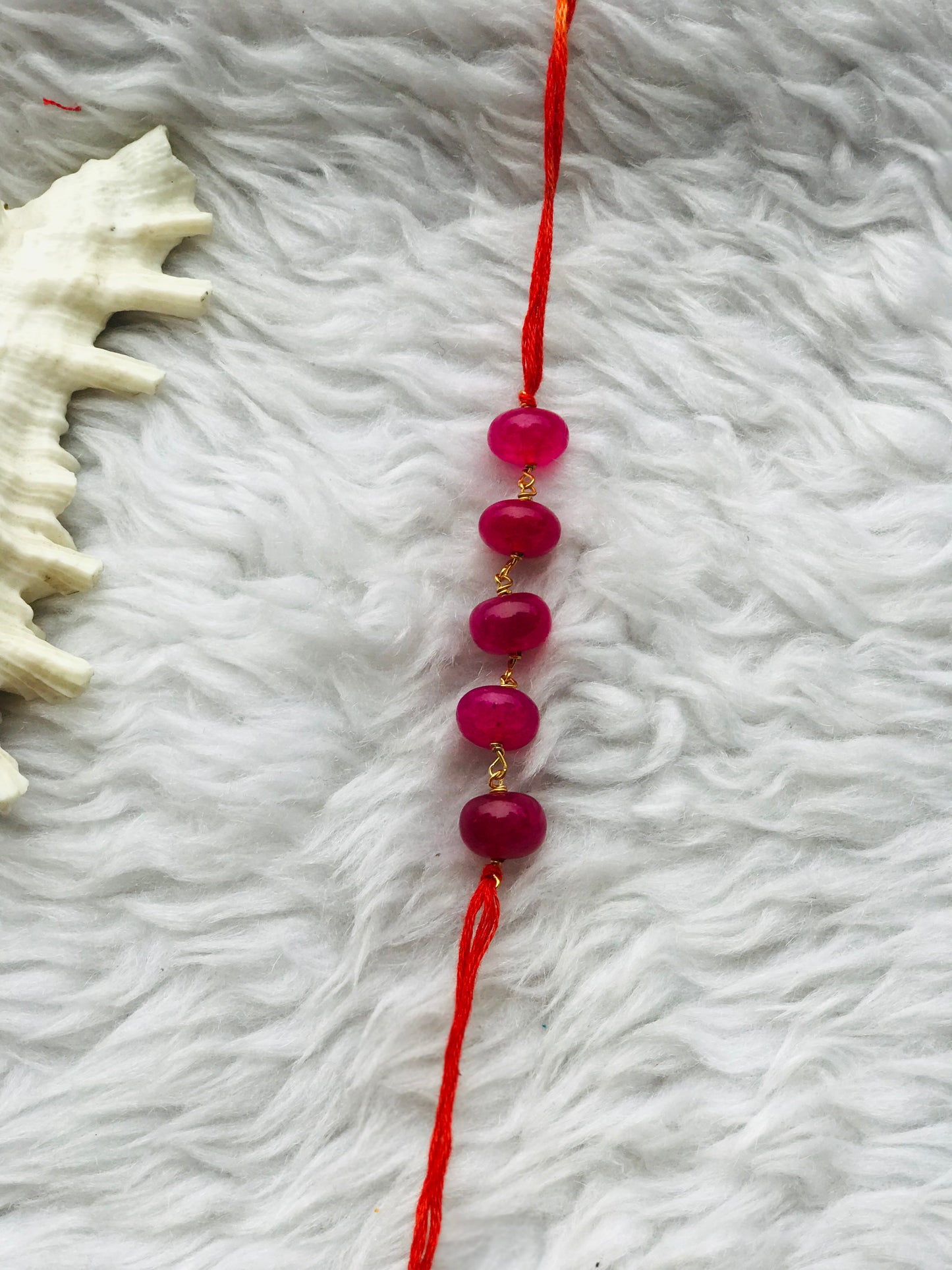 Pink Ropada stone in mauli thread