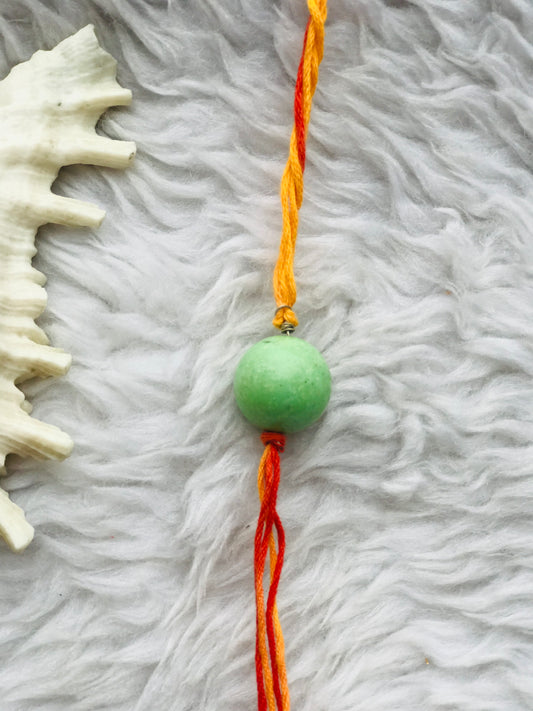 Tourquise green colour stone in mauli thread