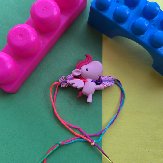 Unicorn eraser with colour beads & thread