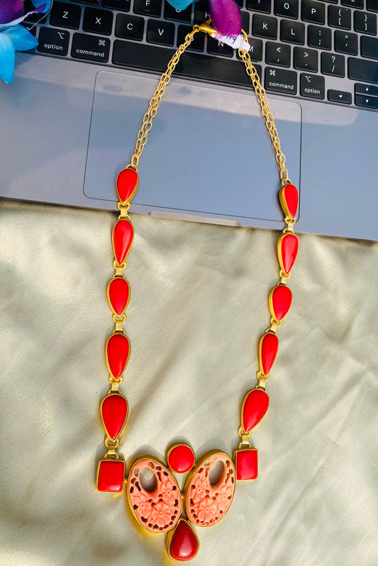 Twin Carved Coral Neckace