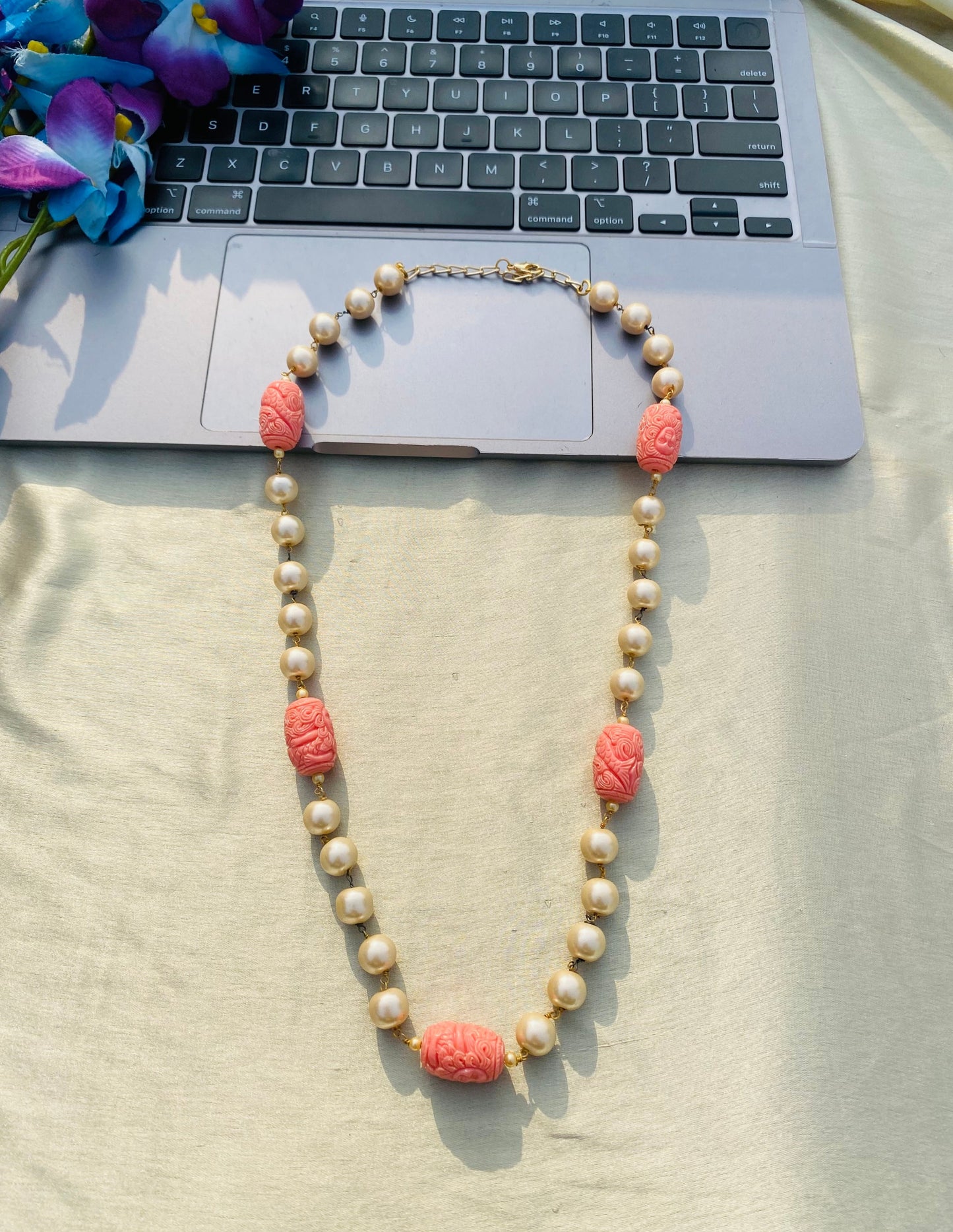 Hint Of Coral in Pearl Necklace