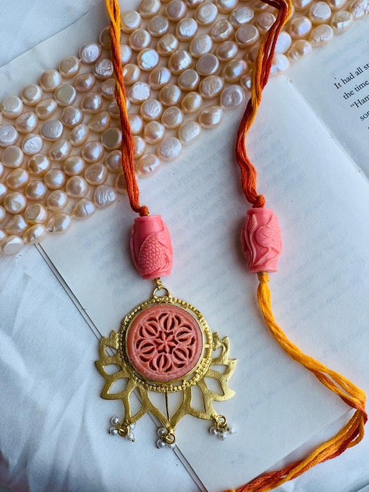Carved Coral with Leaves Design Couple Rakhi